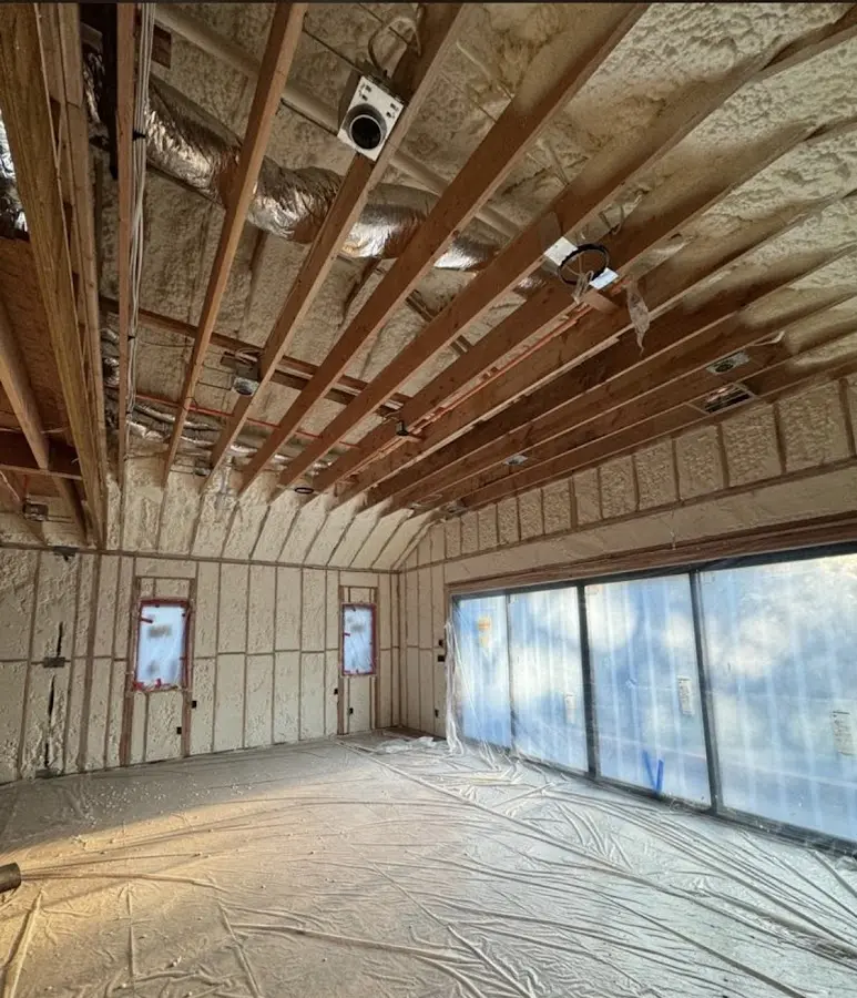 Interior walls and ceiling insulated with spray foam during new construction in Stafford